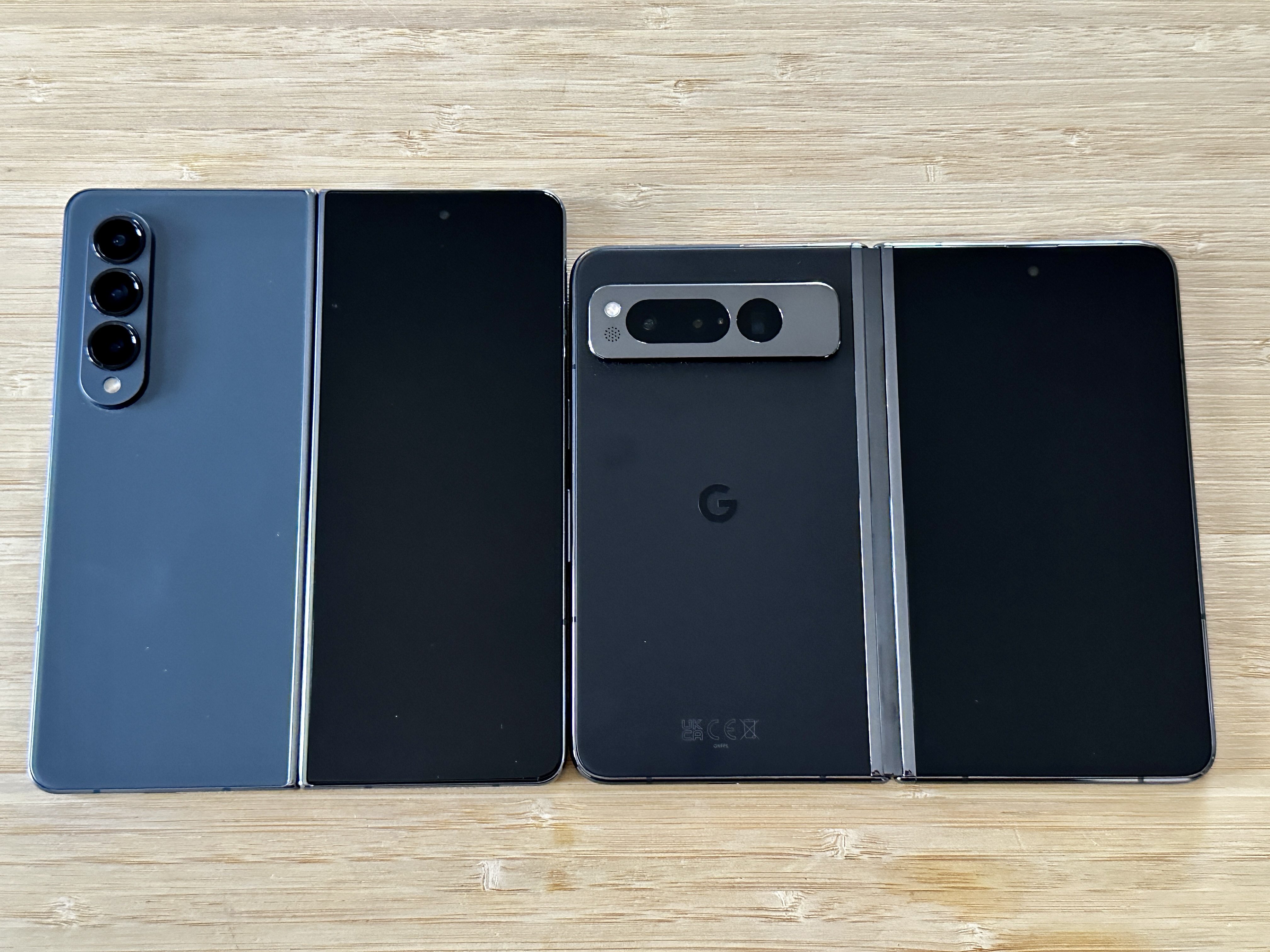 Google Pixel Fold in Obsidian and Samsung Galaxy Z Fold 4 unfolded size comparison.
