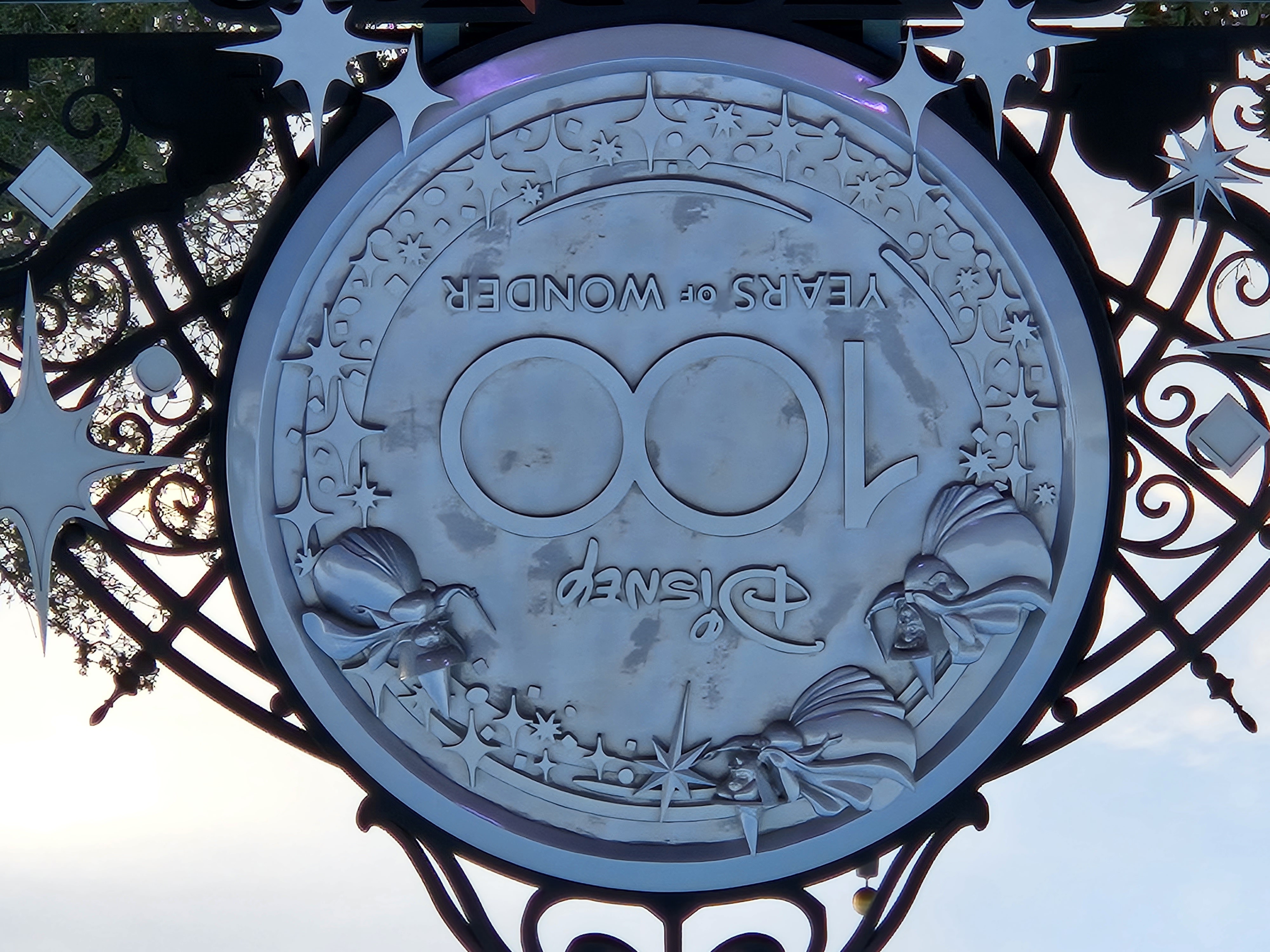 Disney 100 Years of Wonder sign above Disney California Adventure Park at 10X