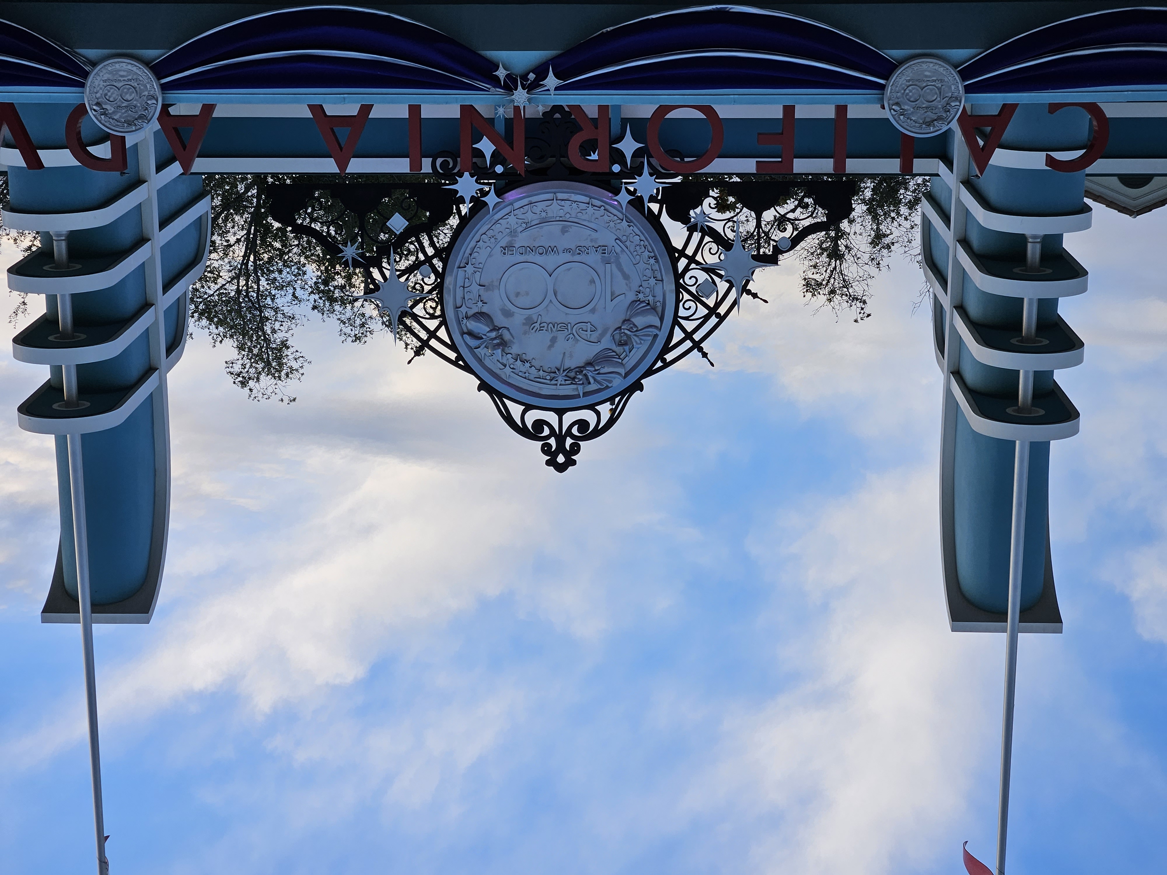 Disney 100 Years of Wonder sign above Disney California Adventure Park at 3X